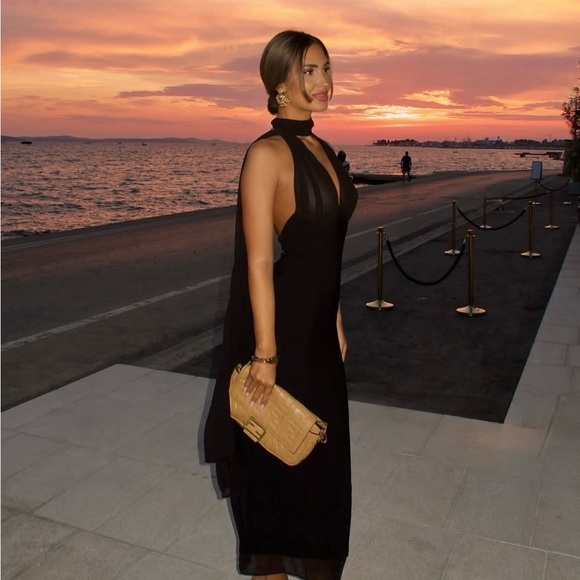 Luzina Midi Dress in Black
Camila Coelho - Picture 3 of 8